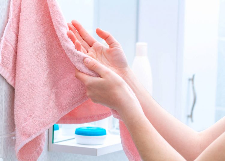 HAND TOWELS MUST BE PLACED WHERE?